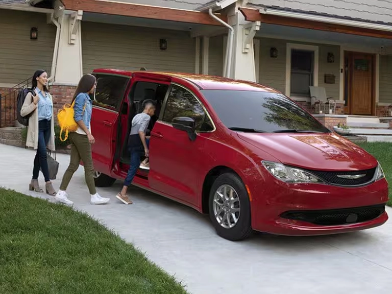 Happy CNH employee with new vehicle at Palmen CDJR Racine