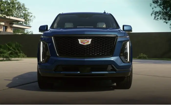 Cadillac Escalade parked in a driveway