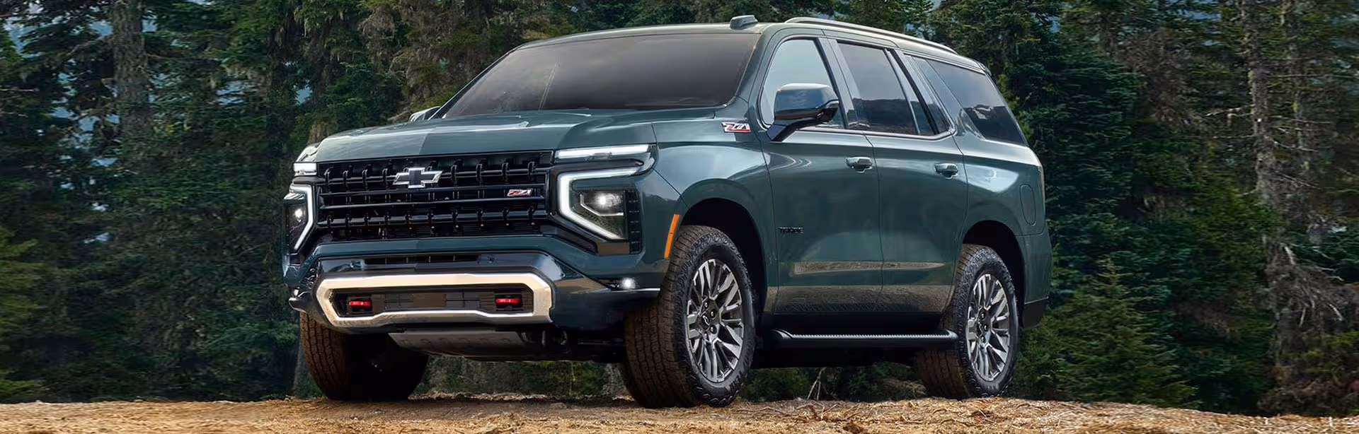 2025 Chevrolet Tahoe parked on a field