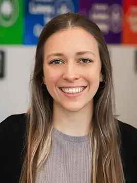 Car Biller Micayla Biffert in Office at Nissan of Rochester