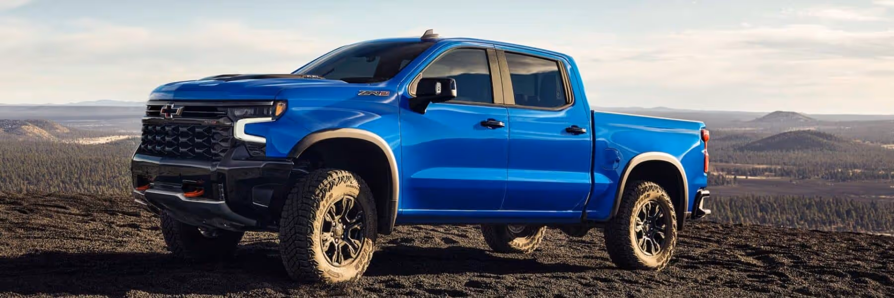 2025 Chevrolet Silverado 1500 parked in a field