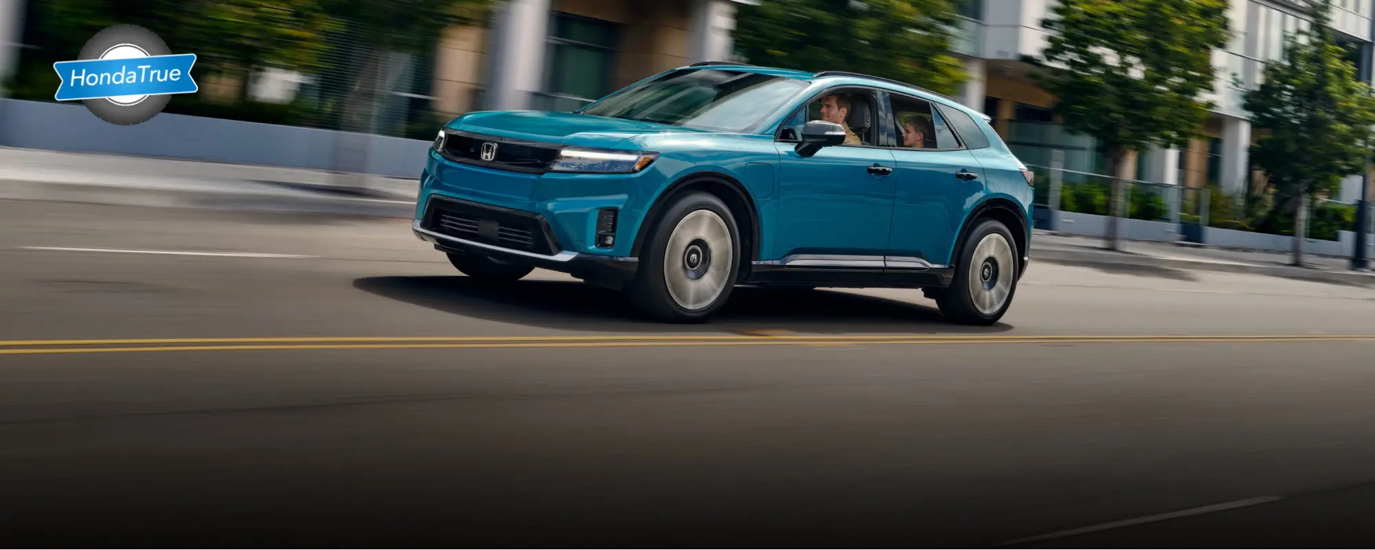 Honda Certified Prologue driving through a city