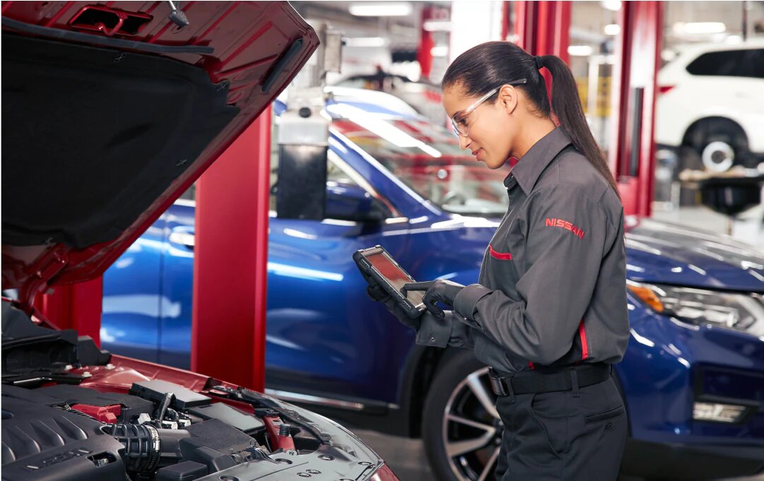 Service Advisor conducting Multi-Point Inspection