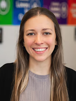 Car Biller Micayla Biffert in Office at GMC of Rochester