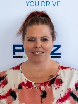 Office Manager Abbi Hotlen in Office at Nissan of Rochester