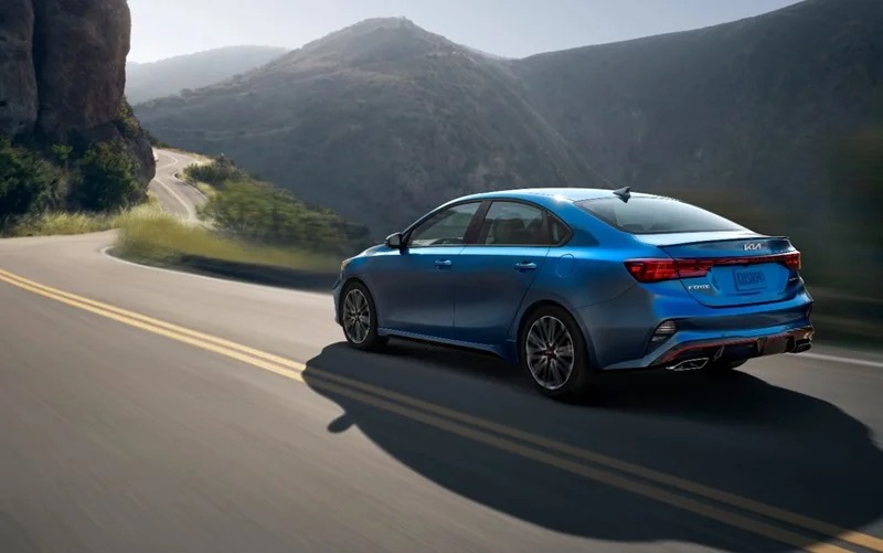 Kia Forte Driving on Mountainside Road