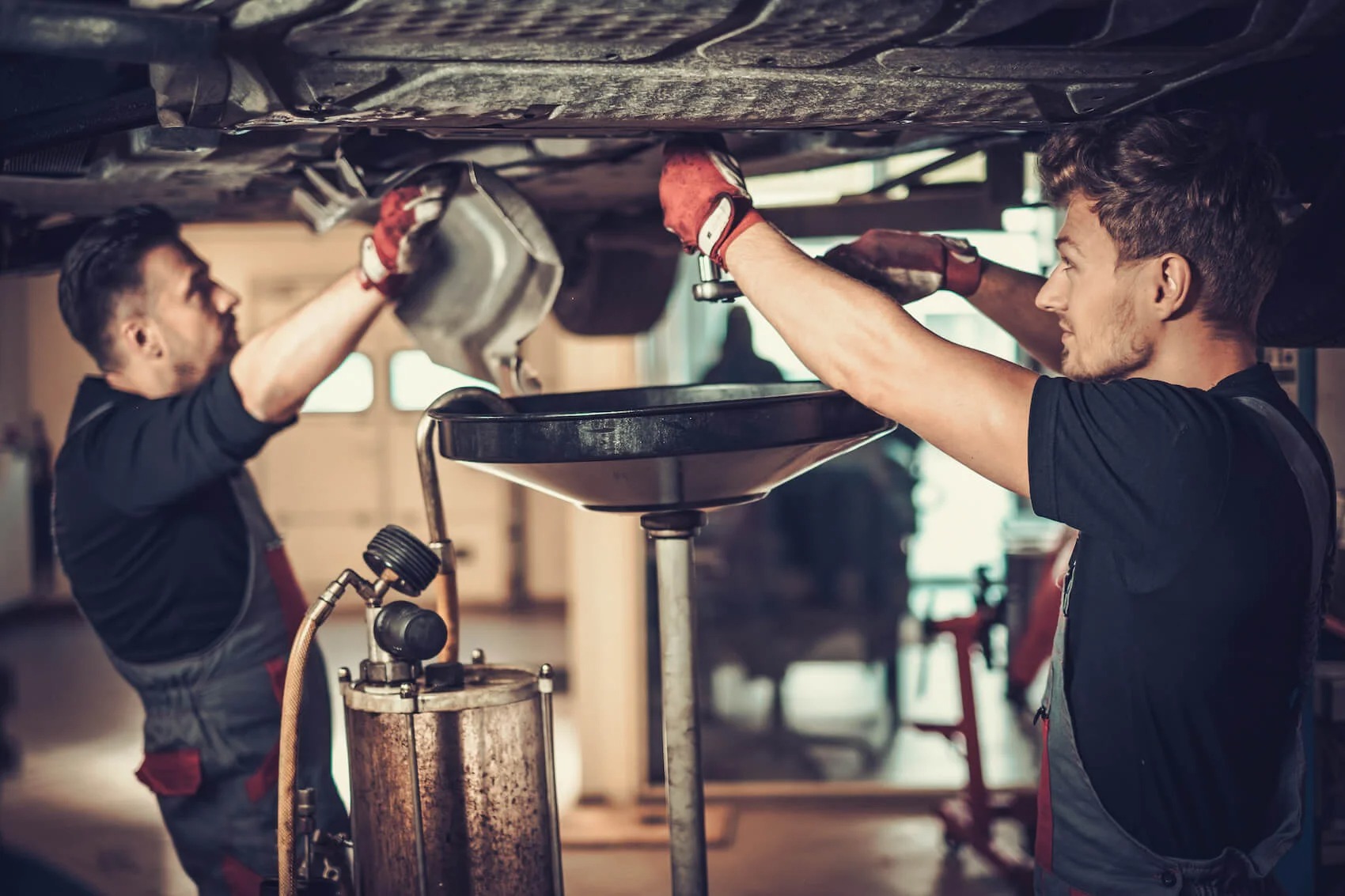 Service Technicians Performing an Oil Change