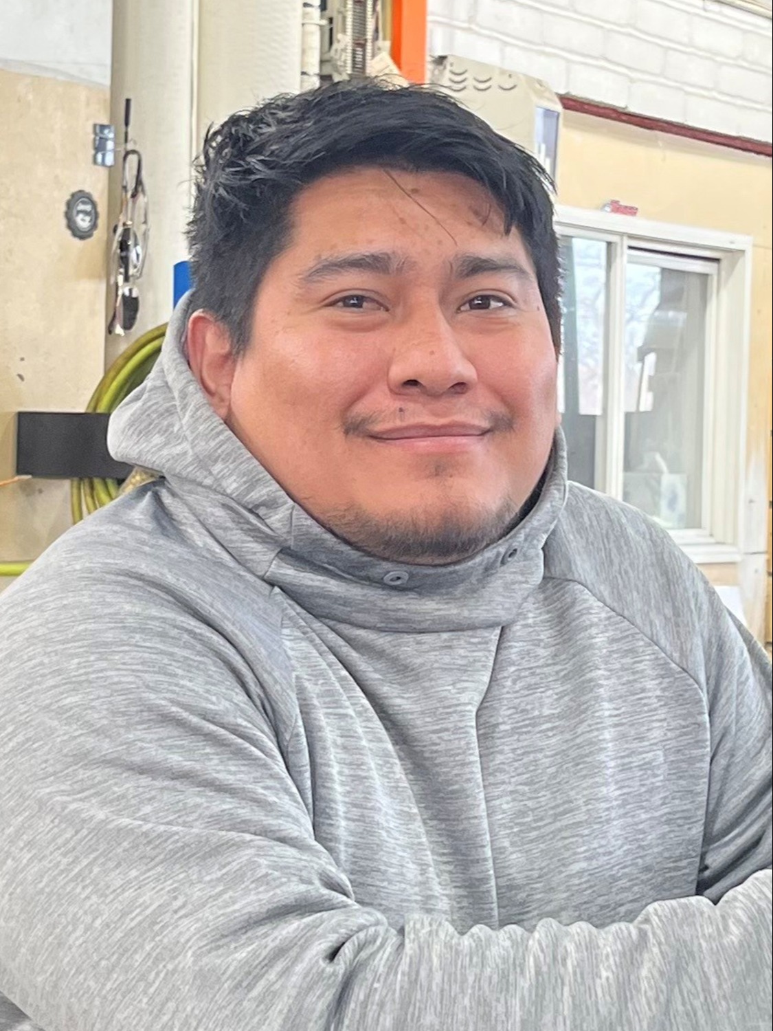 Detailer Andres Montoya in Body Shop at Fury Motors Saint Paul CDJR
