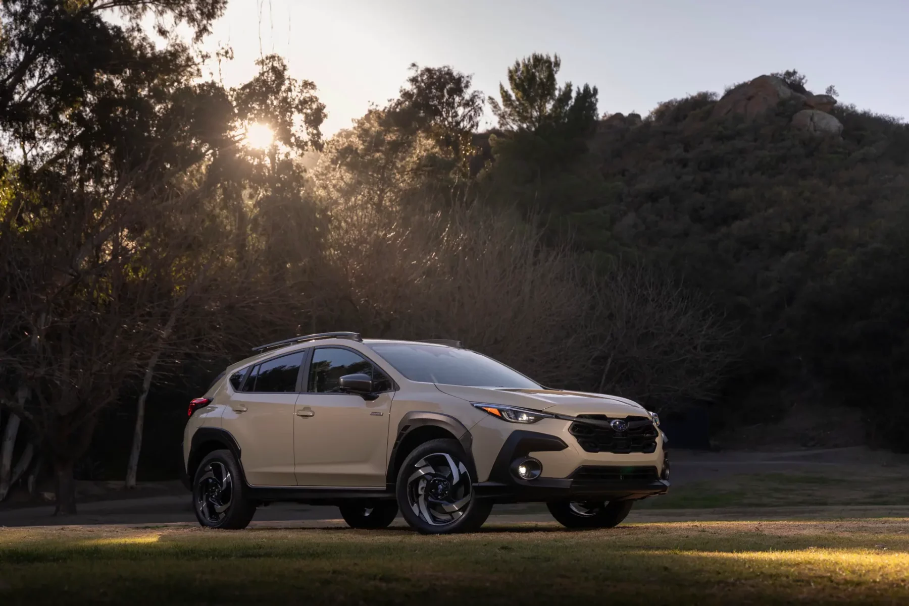 2025 Subaru Crosstrek Hybrid parked in a field