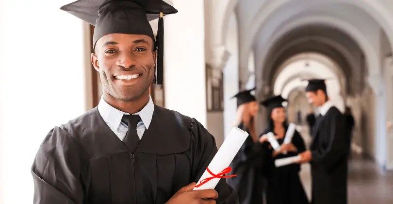 A college graduate holding a diploma