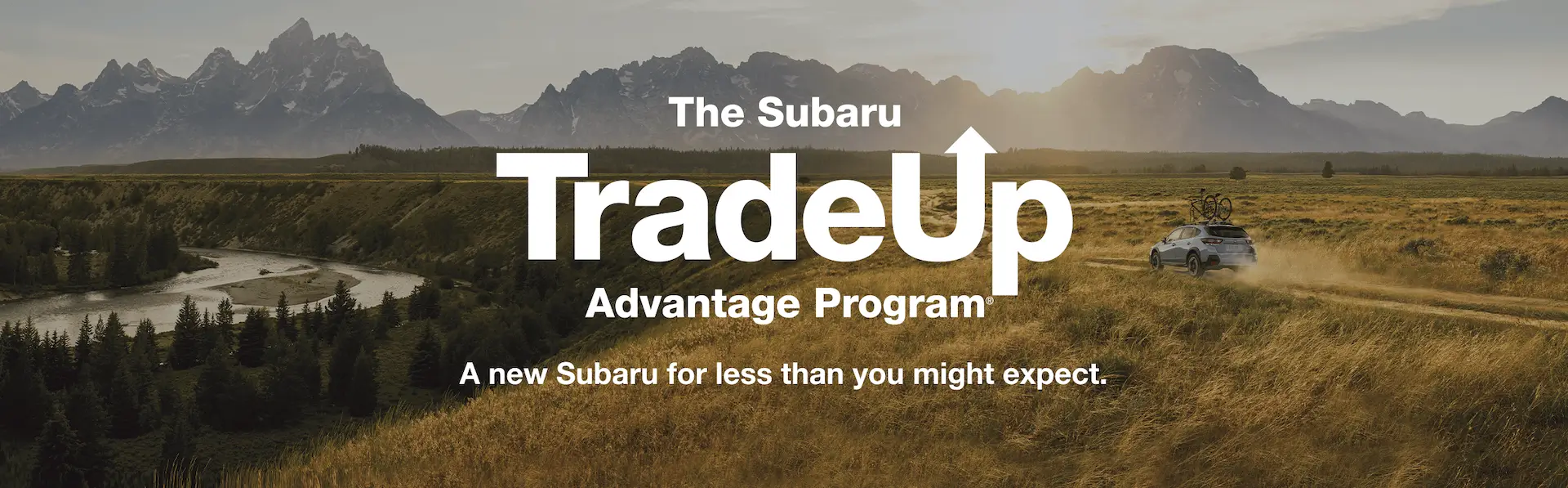 A blue 2023 Subaru Crosstrek with the text “The Subaru TradeUp Advantage Program”