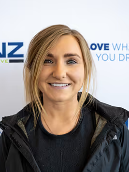 Receptionist Katie Morris in Office at Subaru of Rochester