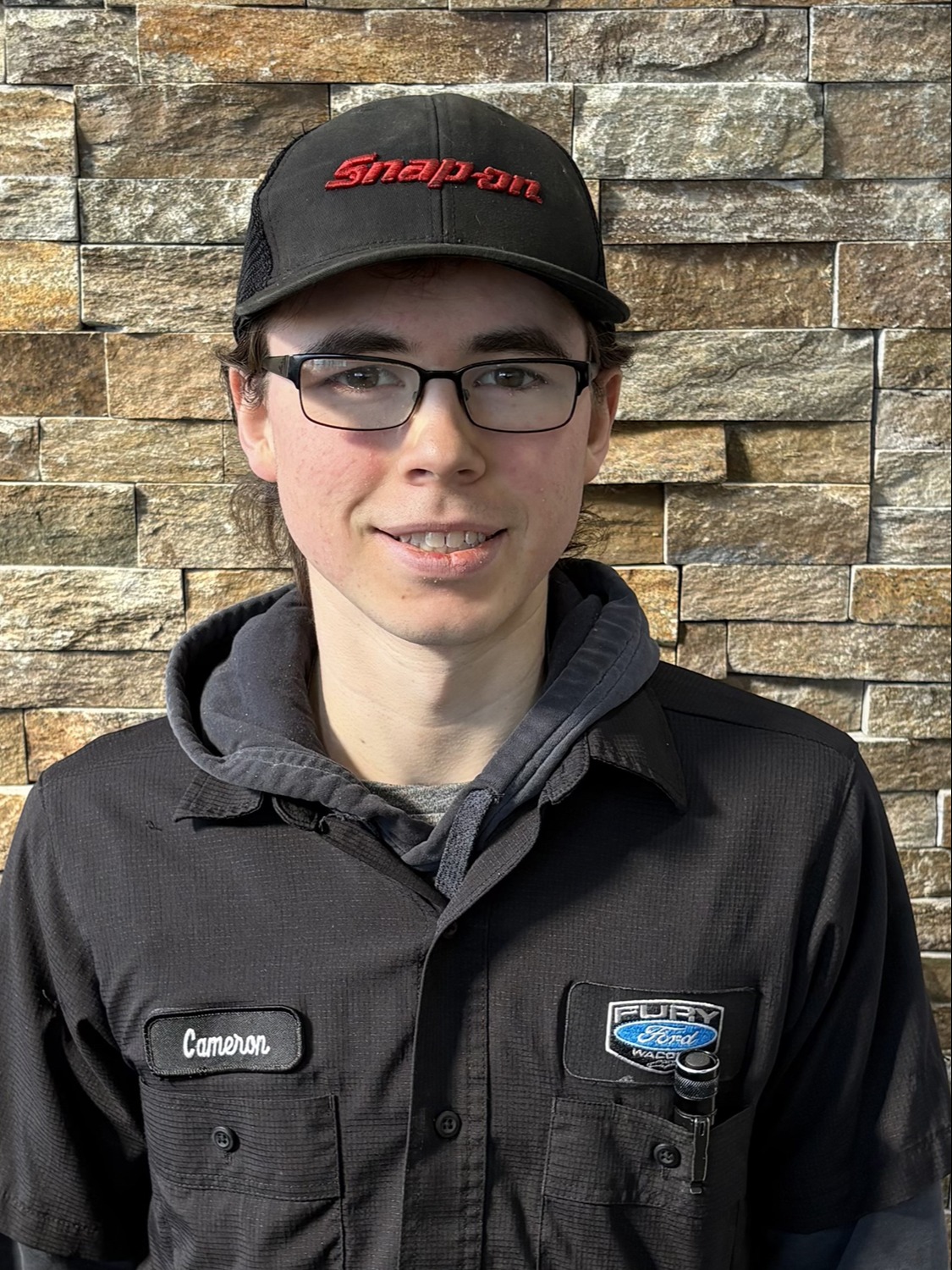 Lube Technician Cameron Pauly in Service at Fury Ford Waconia